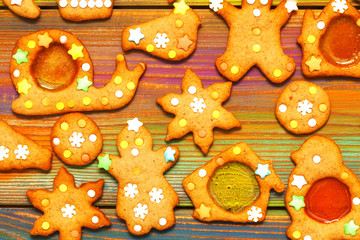 Ginger cookies on a bright multi-colored wooden background
