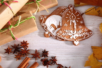 A wonderful decoration made of sweet gingerbread dipped in white icing on Christmas.
