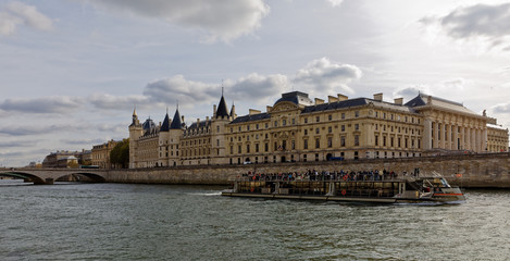 Fototapeta na wymiar Court House, Conciergerie and differents bridges of Paris viewed from river Seine, Paris, France, October 28, 2017