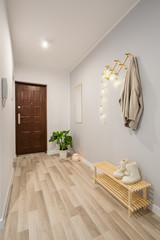 Entryway with wooden floor panels