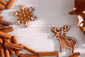 Gingerbread star poured white frosting on Christmas Eve table in a Christmas surprise for guests.
