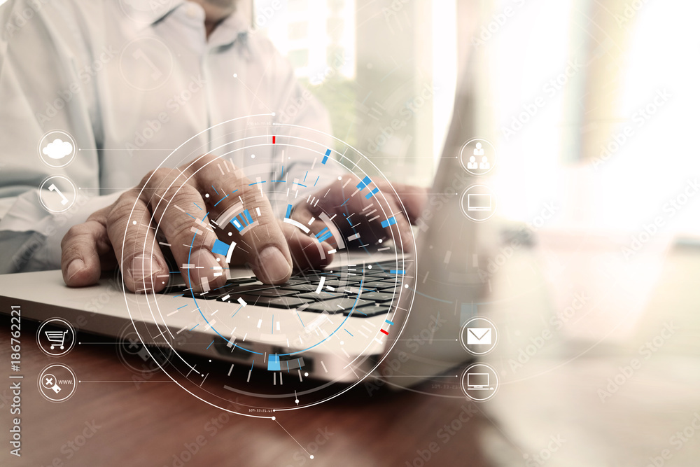 Poster businessman hand working with modern laptop computer in modern office with virtual icon diagram