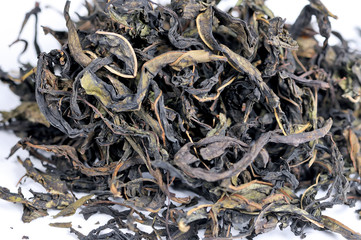 Dry tea leaves of herbal aromatic tea. Close up