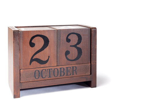 Wooden Perpetual Calendar set to October 23rd