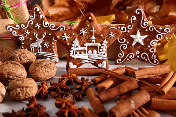 Gingerbread star poured white frosting on Christmas Eve table in a Christmas surprise for guests.
