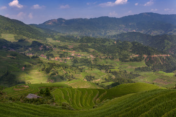 Fototapeta na wymiar Beautiful view Longsheng Rice Terraces near the of the Dazhai village in the province of Guangxi, China; Concept for travel in China