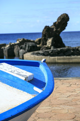 Old vintage boat out of the water