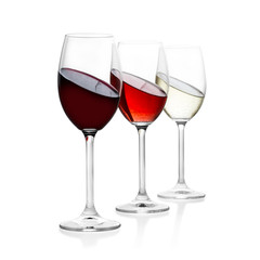 Red, rose and white wine in glass, isolated
