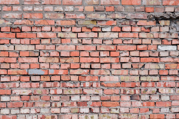 Obraz premium Ceglana tekstura z zadrapaniami i pęknięciami