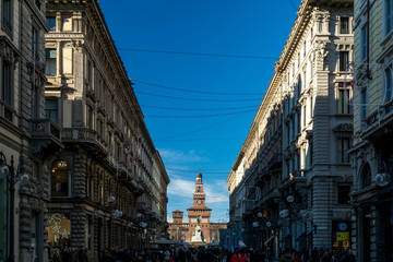 Fototapeta na wymiar Castello Sforzesco and Via Dante in Milano, Italy