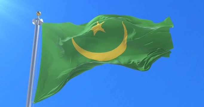 Flag of Mauritania waving at wind with blue sky in slow, loop