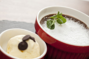 souffle served on a table in a restaurant with focus on mint leafs