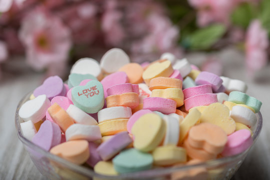Bowl of heart  candy with focus on Love you heart piece