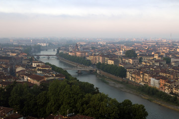 Verona's cityscape early in the morning. Roofs and buildings of the old Italian city.