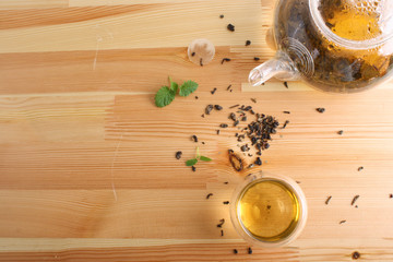 tea cup teapot wooden background
