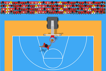 top view of player make slam dunk basketball infront of supporter