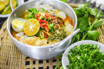 Hot and spicy curry noodle on the table. Curry noodle is a one of the popular foods in asia.