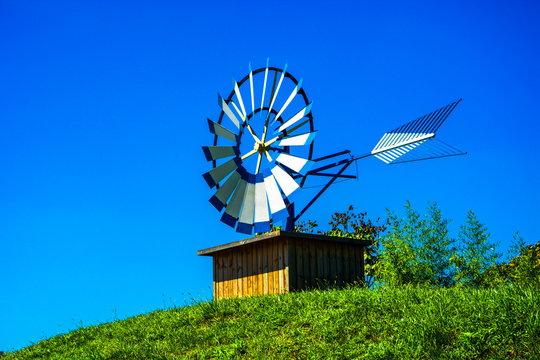 small windmills on the lawn