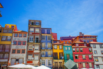 Colorful Houses at Ribeira District, Porto , Portugal. Multicolor Design concept. Architecture with colorful facade. 