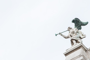 Angel blowing a trumpet