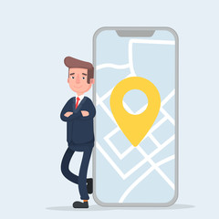 Fototapeta na wymiar Businessman and smartphone with map on the screen.