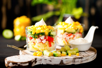 Salad with crab sticks,  corn and fresh cucumber