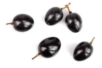 Dark grapes isolated on white background, top view. Flat lay