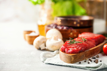 Raw steak fillet with vegetables