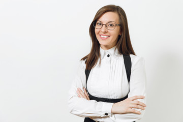 Beautiful caucasian young smiling brown-hair business woman in black suit, white shirt and glasses holding hands crossed isolated on white background. Manager or worker. Copy space for advertisement.