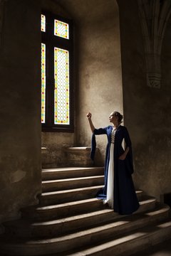 princess balcony medieval dress ancient young blue dress castle stairs window fairytale