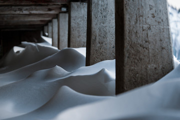 Drawings of snow accumulated inside a farmhouse