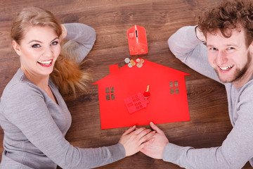 Couple on floor with symbols.
