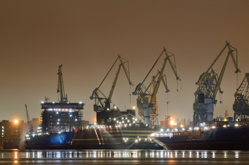 The city shipyard at night.