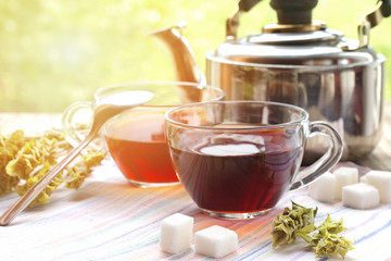Herbal tea in sunny summer day.