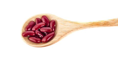 Red beans in wooden spoon isolated on white background