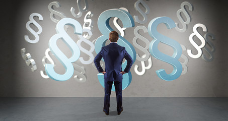 Businessman using law interface on a wall 3D rendering