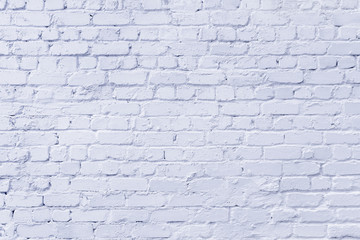 Newly-whitewashed brick wall, textured background