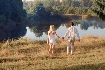 Fototapeta premium happy young couple in summer park