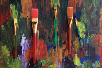 Fototapeta na wymiar color brushes on the palette