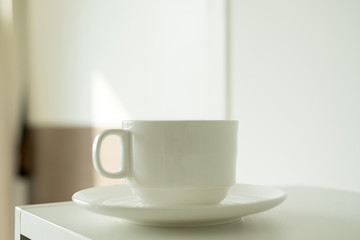 morning Hot  coffee in  Cup of coffee on window sill room