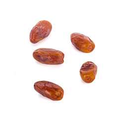 dried fruits from date palm isolated on white background