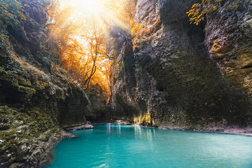 Plakat Canyon with blue water river in autumn. Selective focus.