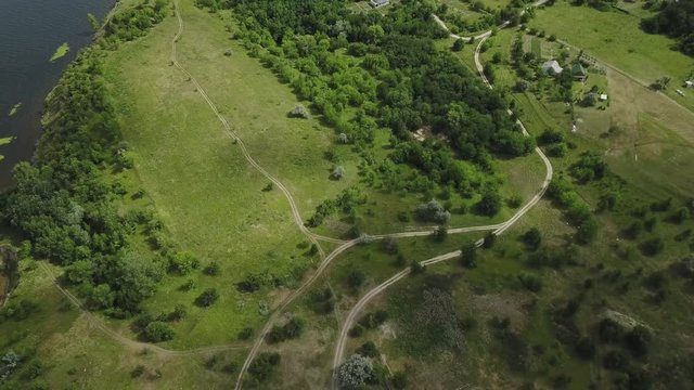 Aerial View. Flying over the beautiful summer River. Aerial camera shot.