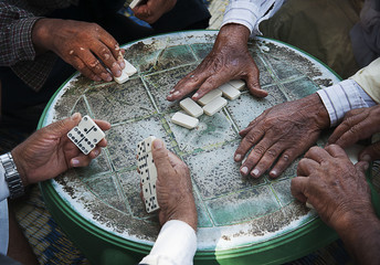 Muslim men playing blackgammon