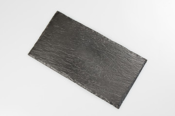 Slate stone tray isolated on white background, top view