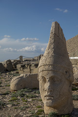 Toppled heads of the gods on East terrace at the top of Nemrut dagi in Turkey. The UNESCO World...