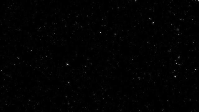 Animated Falling 3D Dust Particles Swirling over Black Background.  HD Resolution. 15 Seconds.