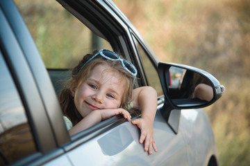 Girl in Opened Window of Car