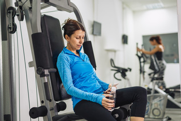 sporty woman taking a break after her workout