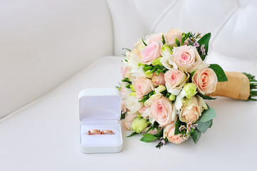 Bridal bouquet and wedding rings